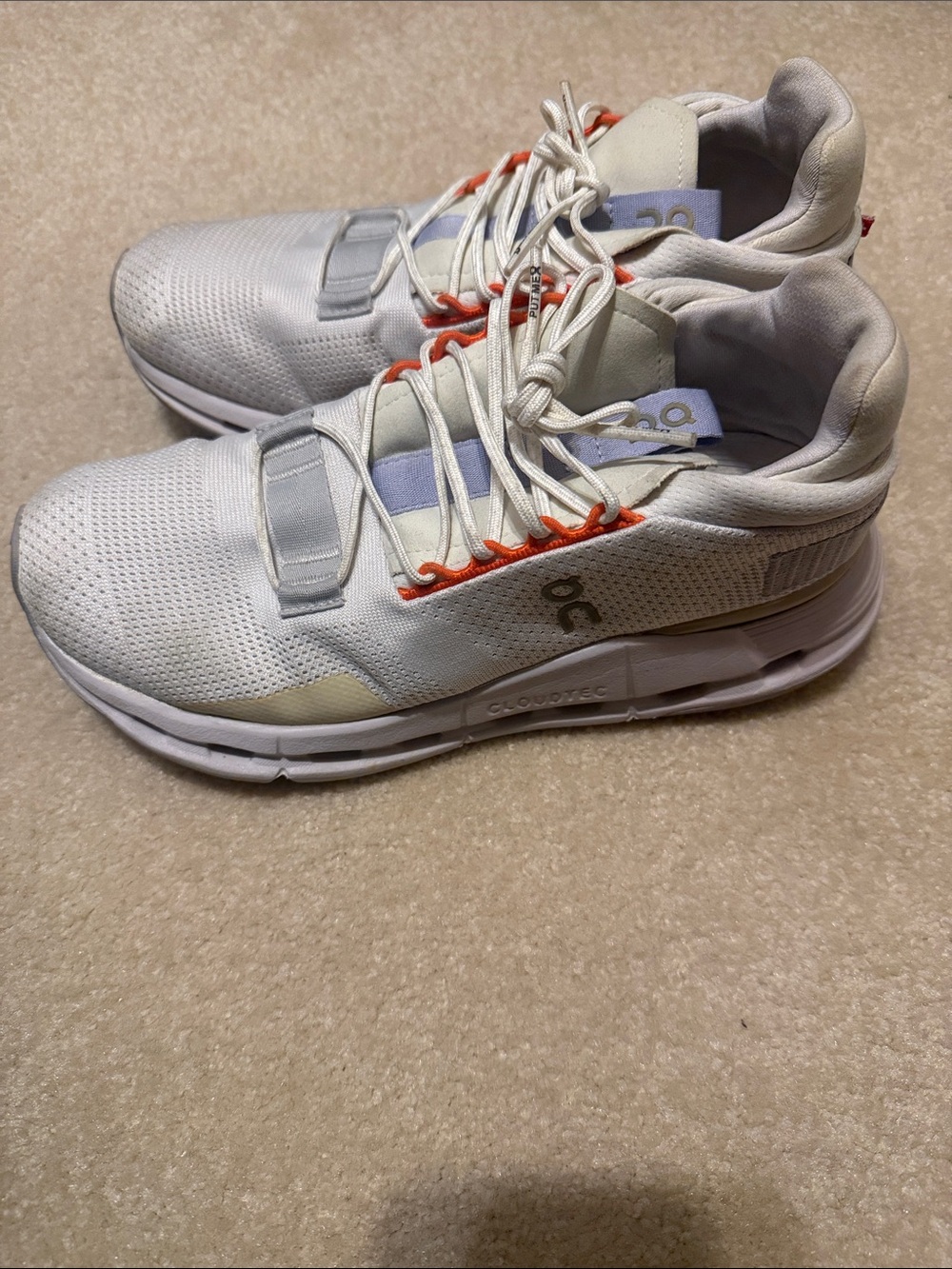 On Running womens White Sneakers with Orange Trim